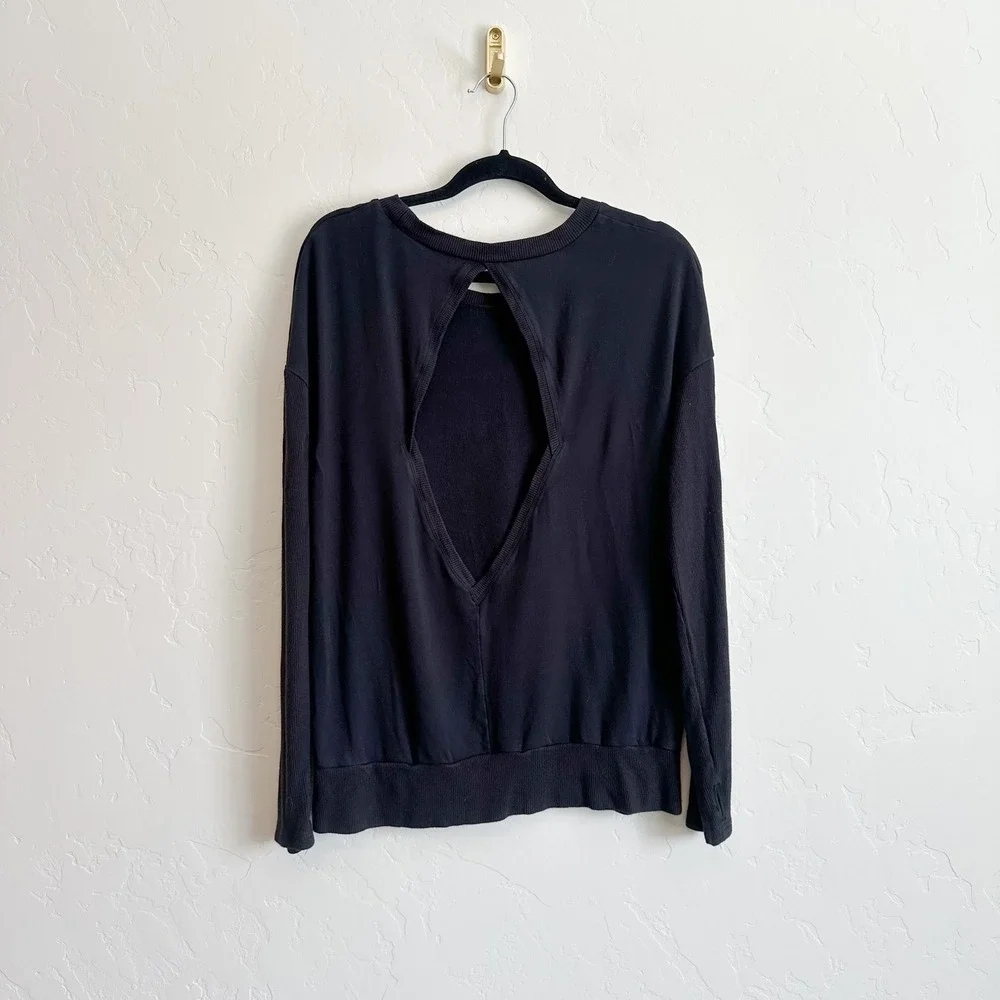 Alo Yoga | Intricate Long Sleeve Keyhole Cutout Yoga Tee Top in Black